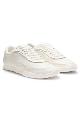 Embossed-logo trainers in leather, White