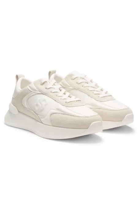 Suede-trim trainers in faux leather