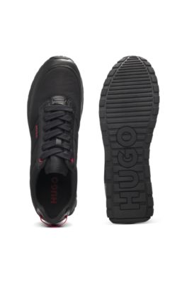 Baskets style chaussures de course &agrave; d&eacute;tail en zigzag, Noir