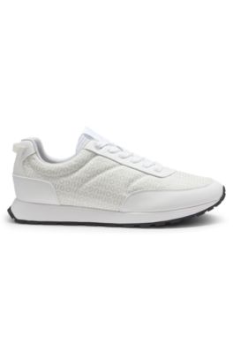 Low-top trainers with monogrammed uppers, White