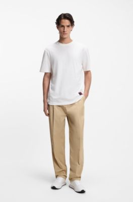 Low-top trainers with monogrammed uppers, White