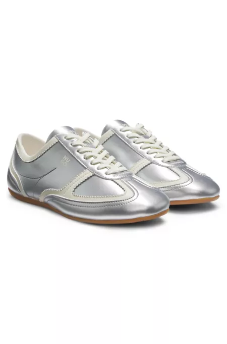 Comfort-insole trainers with silver-tone uppers