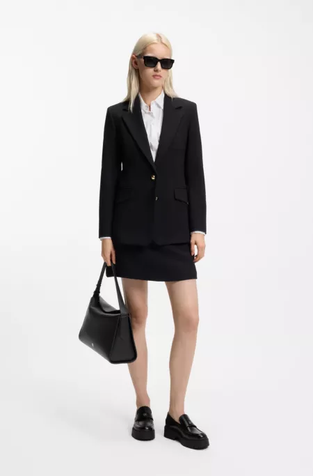 Stacked-logo shoulder bag in faux leather