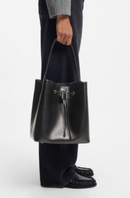 Logo-lettering bucket bag in leather, Black