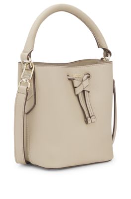 Logo-lettering bucket bag in leather, Light Beige