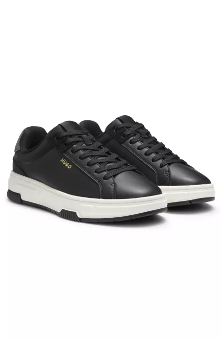 Trainers in faux leather