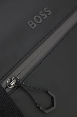 Reflective-detail holdall in faux leather, Black