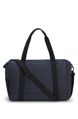 Reflective-detail holdall in faux leather, Dark Blue