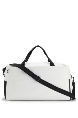 Faux-leather holdall with reflective zips, White