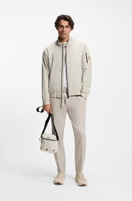 Reflective-detail reporter bag in faux leather