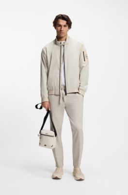 Bolso mensajero de piel sint&eacute;tica con detalles reflectantes, Beige claro