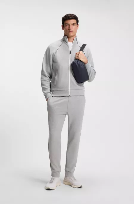 Faux-leather belt bag with reflective zips