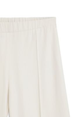 Pantalones relaxed fit de pernera ancha en sarga ligera, Blanco
