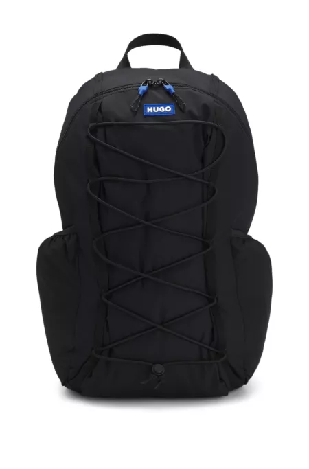 Backpack with blue rubber logo patch
