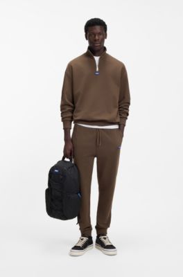 Backpack with blue rubber logo patch, Black