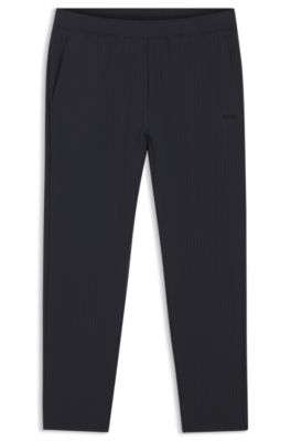 Pantalones en tejido de rejilla el&aacute;stico con cord&oacute;n en la cintura y cremallera enmarcada, Azul oscuro