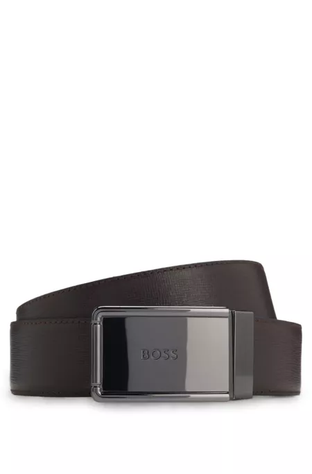 Reversible leather belt with pin and plaque buckles