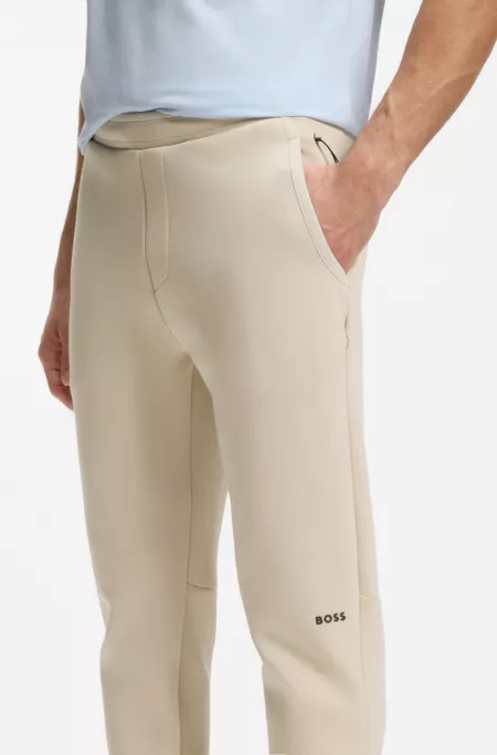 Reflective-graphic tracksuit bottoms in a cotton blend