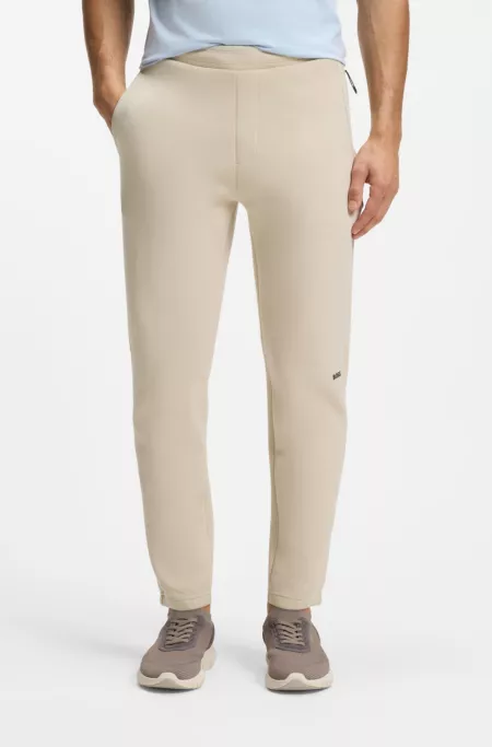 Reflective-graphic tracksuit bottoms in a cotton blend