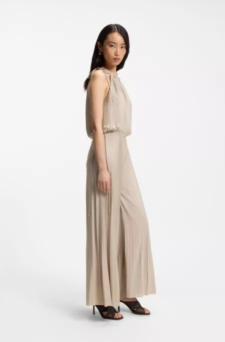 Plissé-pleat jumpsuit with halterneck