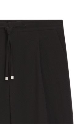 Modern-fit trousers in stretch-cotton seersucker, Black