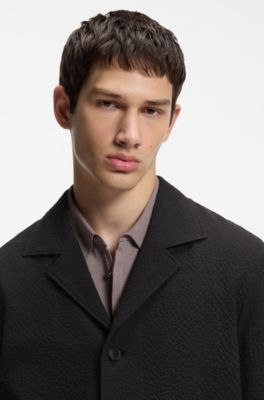Modern-fit jacket in stretch-cotton seersucker, Black