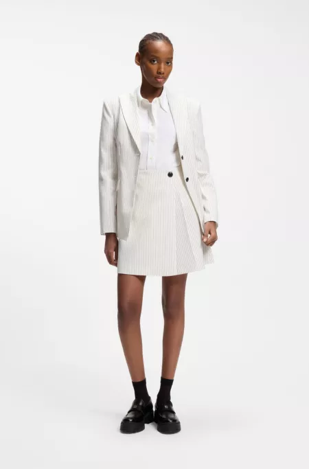 Faux-wrap mini skirt with pinstripe