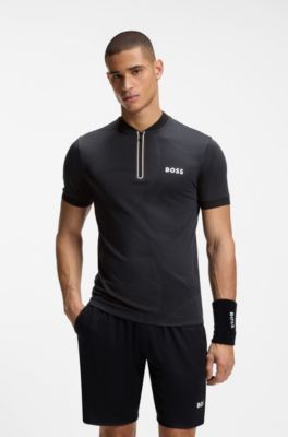 Polo slim fit en punto con detalles anat&oacute;micos y cuello con cremallera, Negro