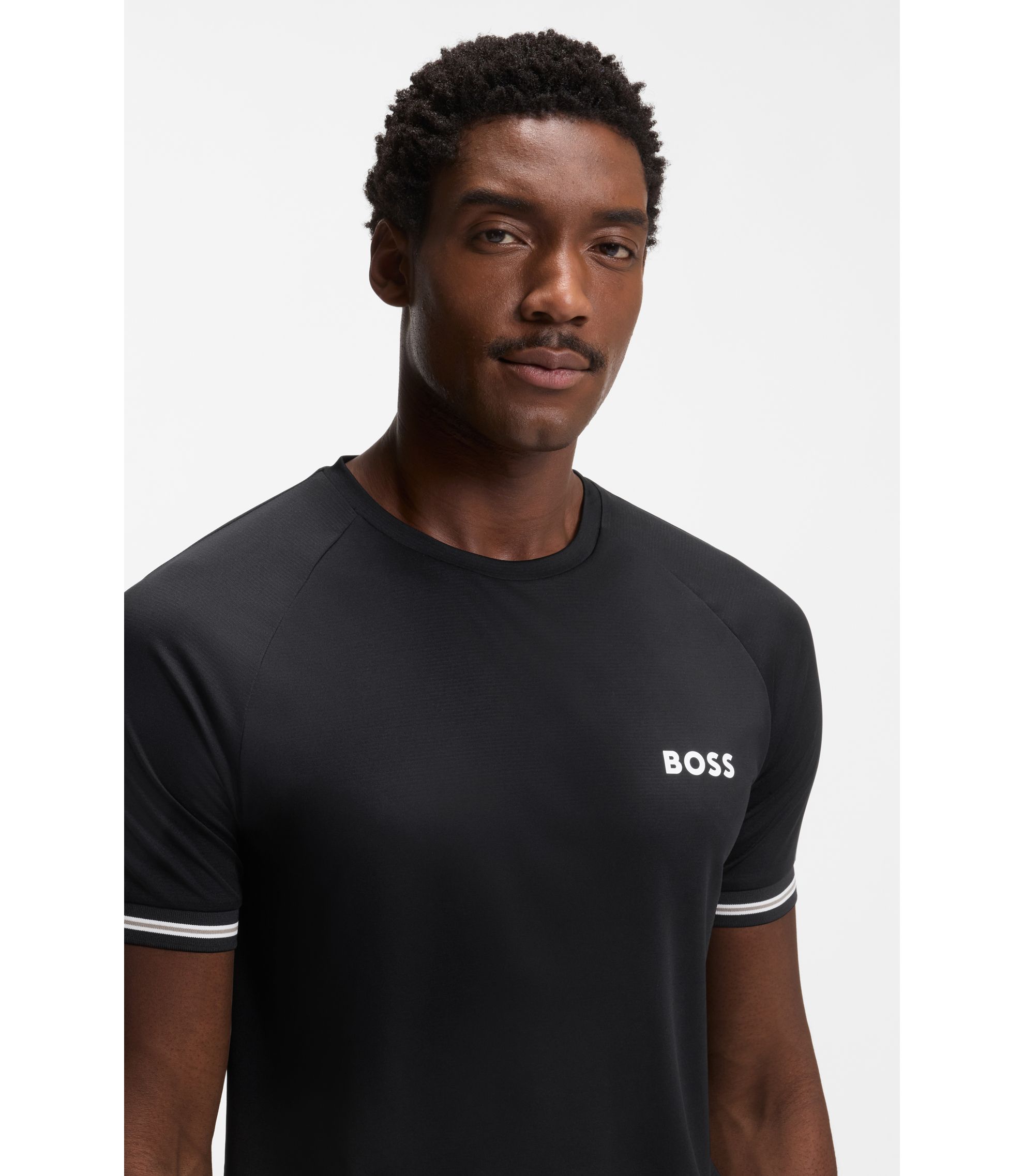 BOSS - Active slim-fit T-shirt with tennis-ball embossing - Black