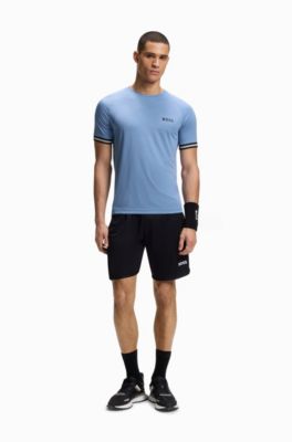 Camiseta deportiva slim fit con grabado de pelota de tenis, Celeste