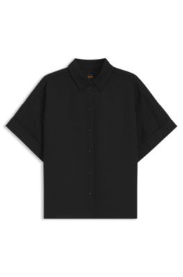 Blusa regular fit con pu&ntilde;os enrollados, Negro