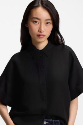 Blusa regular fit con pu&ntilde;os enrollados, Negro