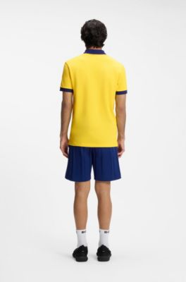 Polo Paddy avec finitions aux couleurs du drapeau national, Jaune clair