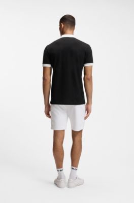Polo de algod&oacute;n el&aacute;stico con detalles de raya, Negro