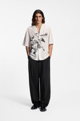 Pantalones de pinzas con detalles en punto de fest&oacute;n, Negro