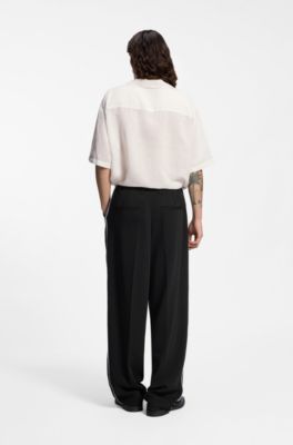 Pantalones de pinzas con detalles en punto de fest&oacute;n, Negro
