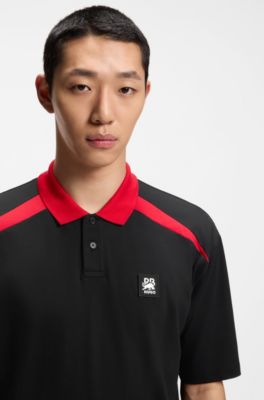 Polo HUGO&nbsp;x&nbsp;RB de algod&oacute;n el&aacute;stico con motivo de toro, Negro