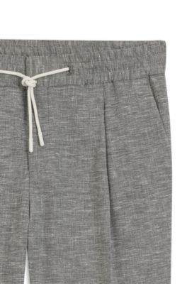 Slim-fit trousers in performance sharkskin, Dark Grey