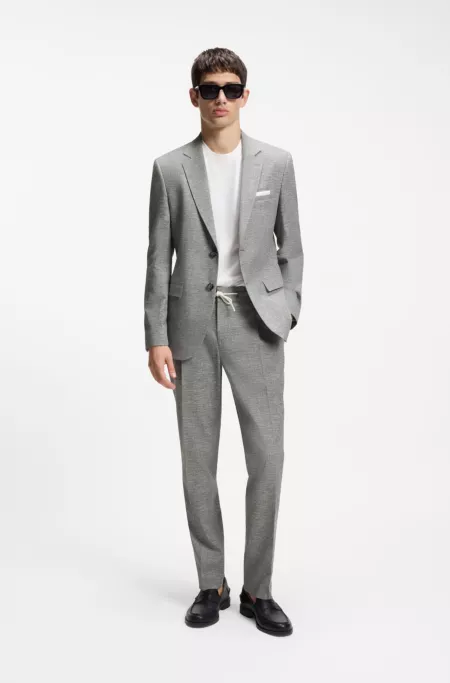 Slim-fit trousers in performance sharkskin