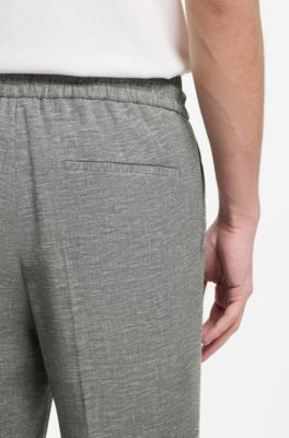 Slim-fit trousers in performance sharkskin, Dark Grey