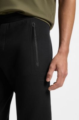 Porsche x BOSS track pants with tonal reflective branding, Black