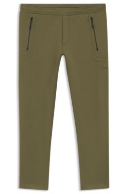 Porsche x BOSS track pants with tonal reflective branding, Light Green