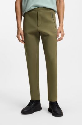 Porsche x BOSS track pants with tonal reflective branding, Light Green