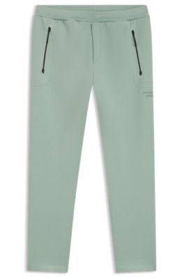 Porsche x BOSS track pants with tonal reflective branding, Light Green