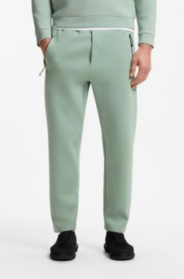 Porsche x BOSS track pants with tonal reflective branding, Light Green