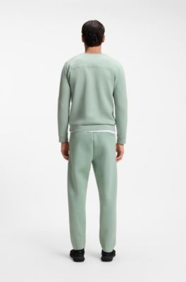 Porsche x BOSS track pants with tonal reflective branding, Light Green