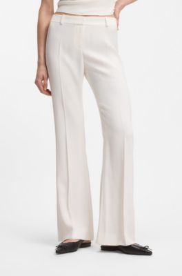 Pantalones regular fit con bajos acampanados, Blanco