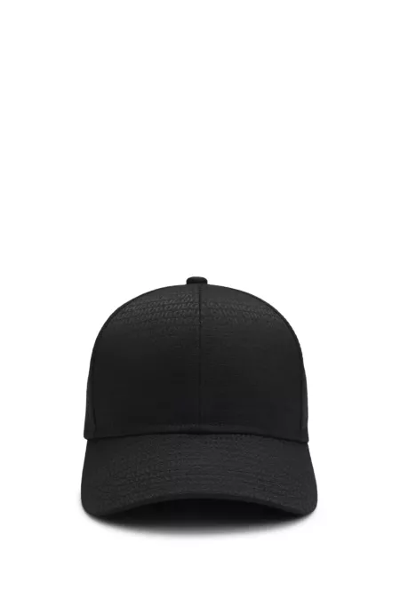 Cap with all-over logo jacquard