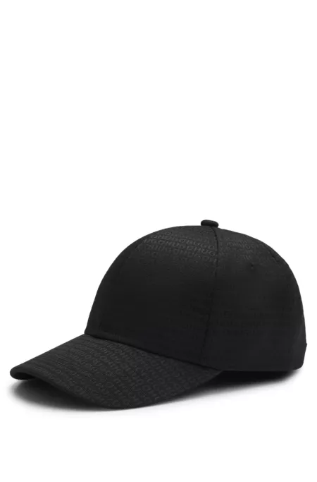 Cap with all-over logo jacquard