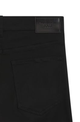 Porsche x BOSS tapered-fit pants in stretch denim, Black
